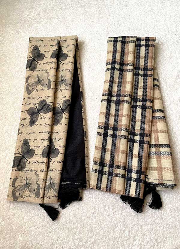 خرید شال جیر پک مشکی کرم طرح‌دار بسته ۱۰ عددی | فروش عمده شال با کیفیت بالا
